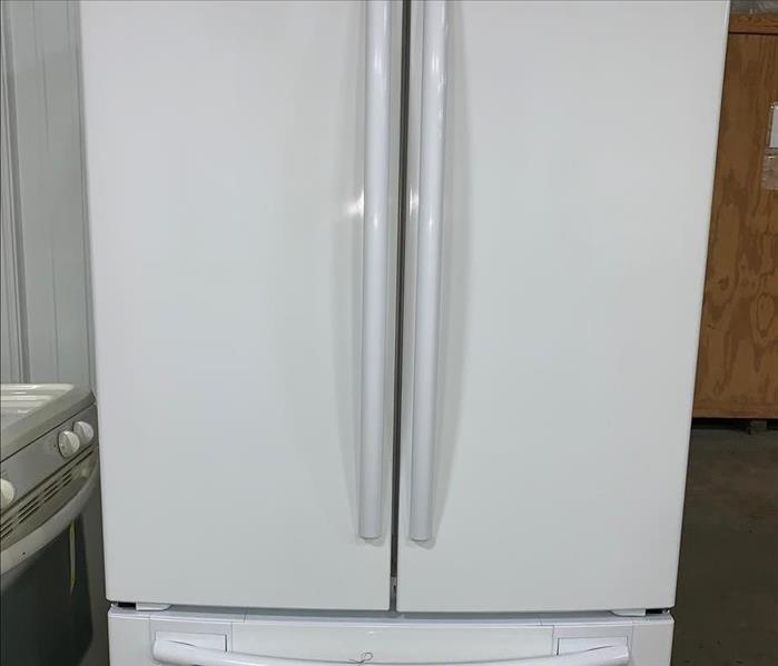 Clean and shiny white refigerator